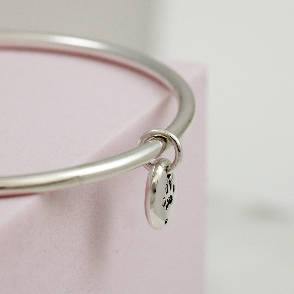 customised engraved pet paw print bangle side view