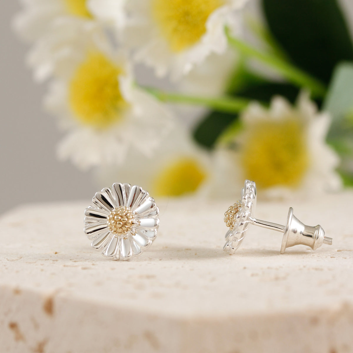 silver daisy flower earrings with solid gold middles