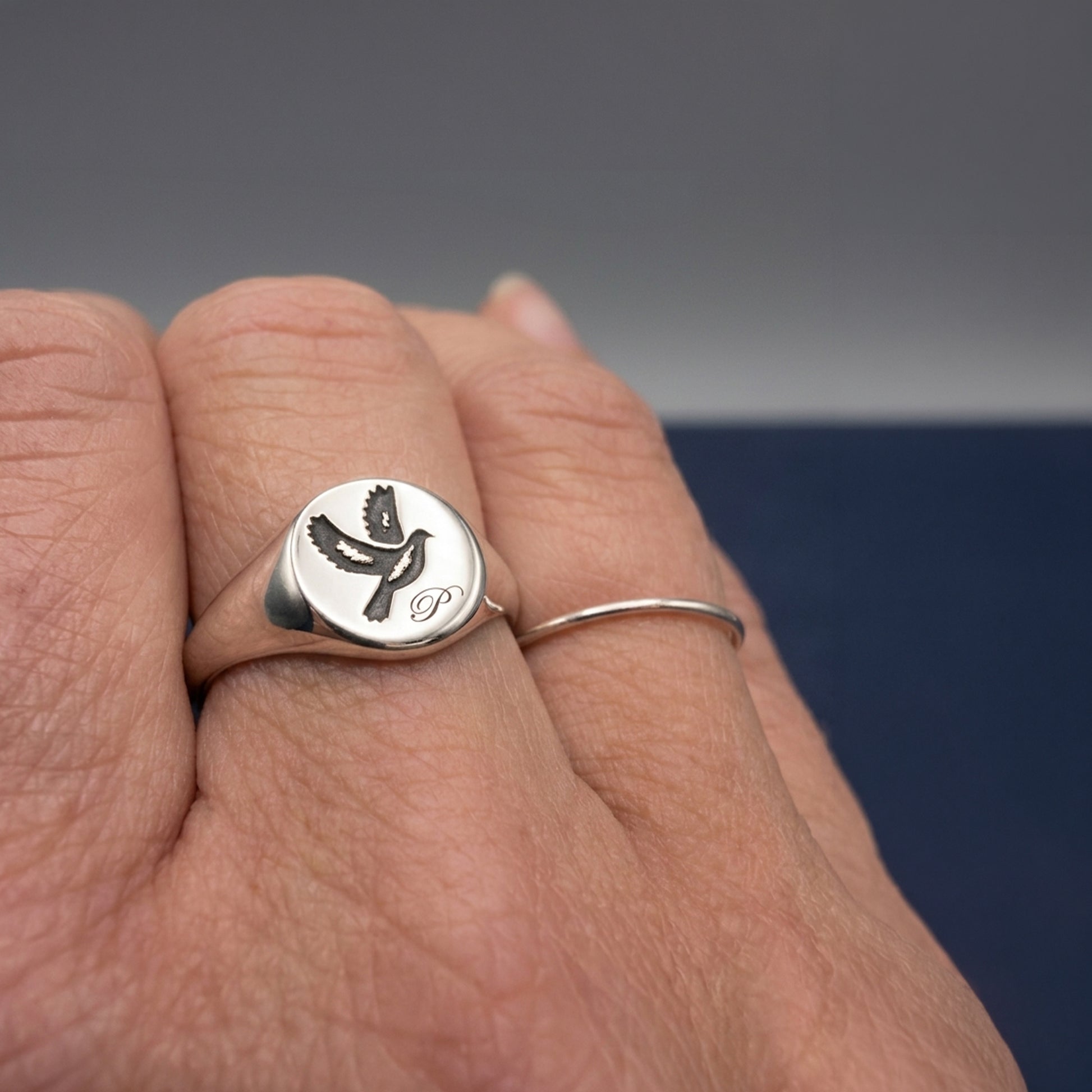 custom signet ring engraved with Dove and letter P