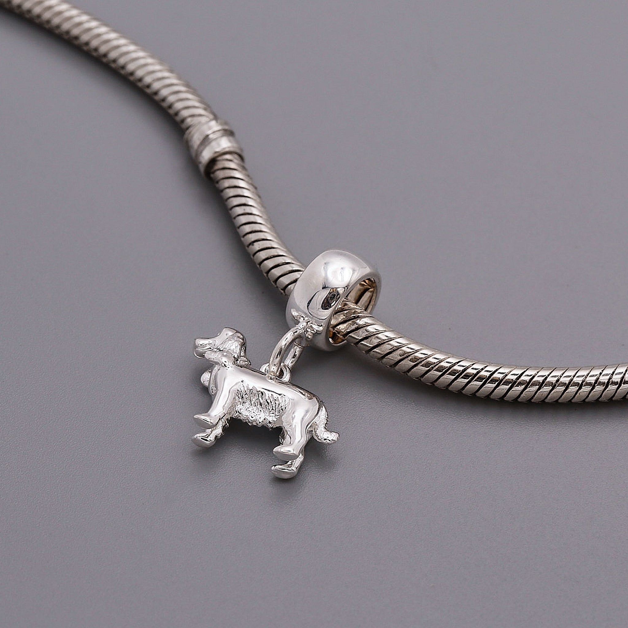 silver english cocker spaniel charm on charm carrier shown on pandora chain
