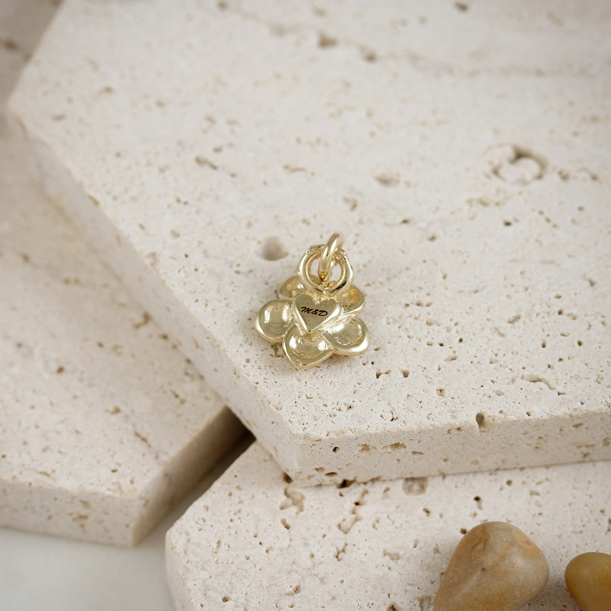 solid gold forget me not flower pendant with engraving for personalised gift