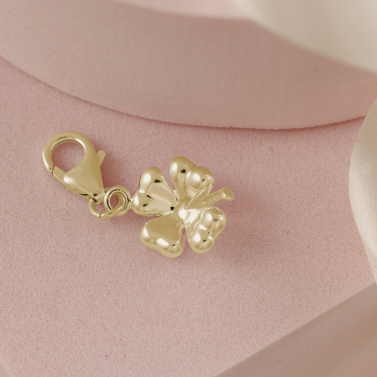 gold plated four leaf clover charm with clip on clasp