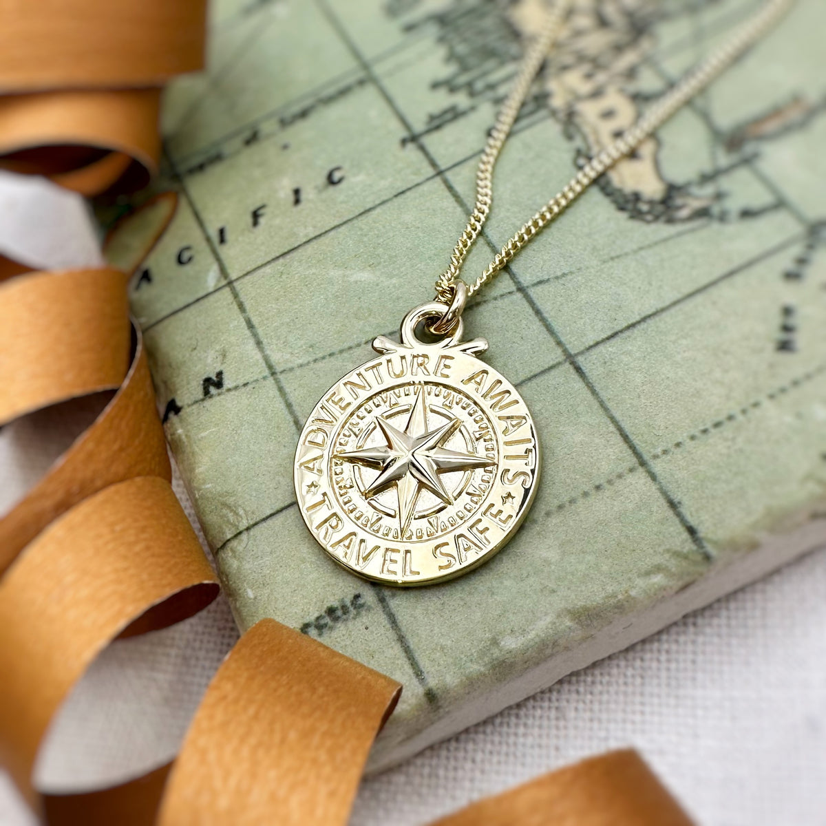 solid gold compass necklace travel safe adventure awaits