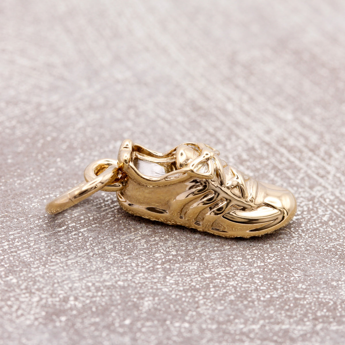 gold plated running shoe silver charm