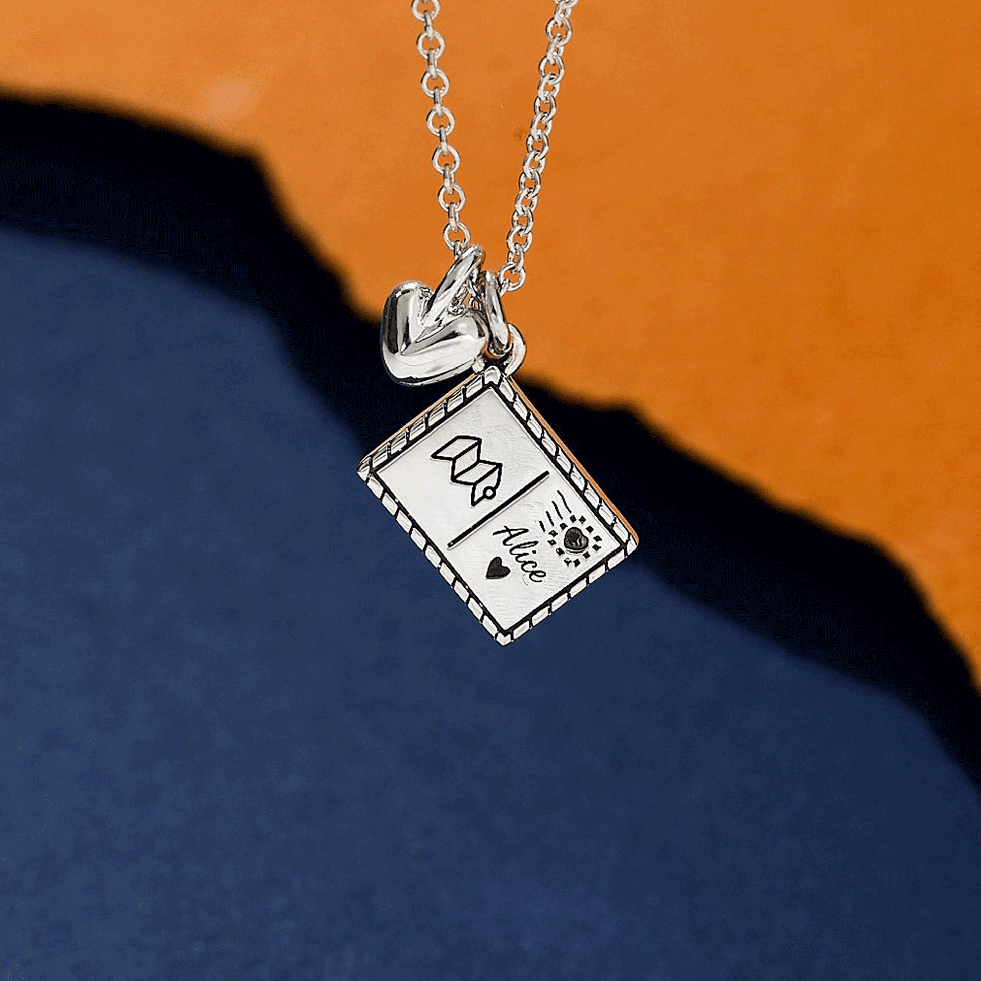 silver personalised postcard with heart necklace