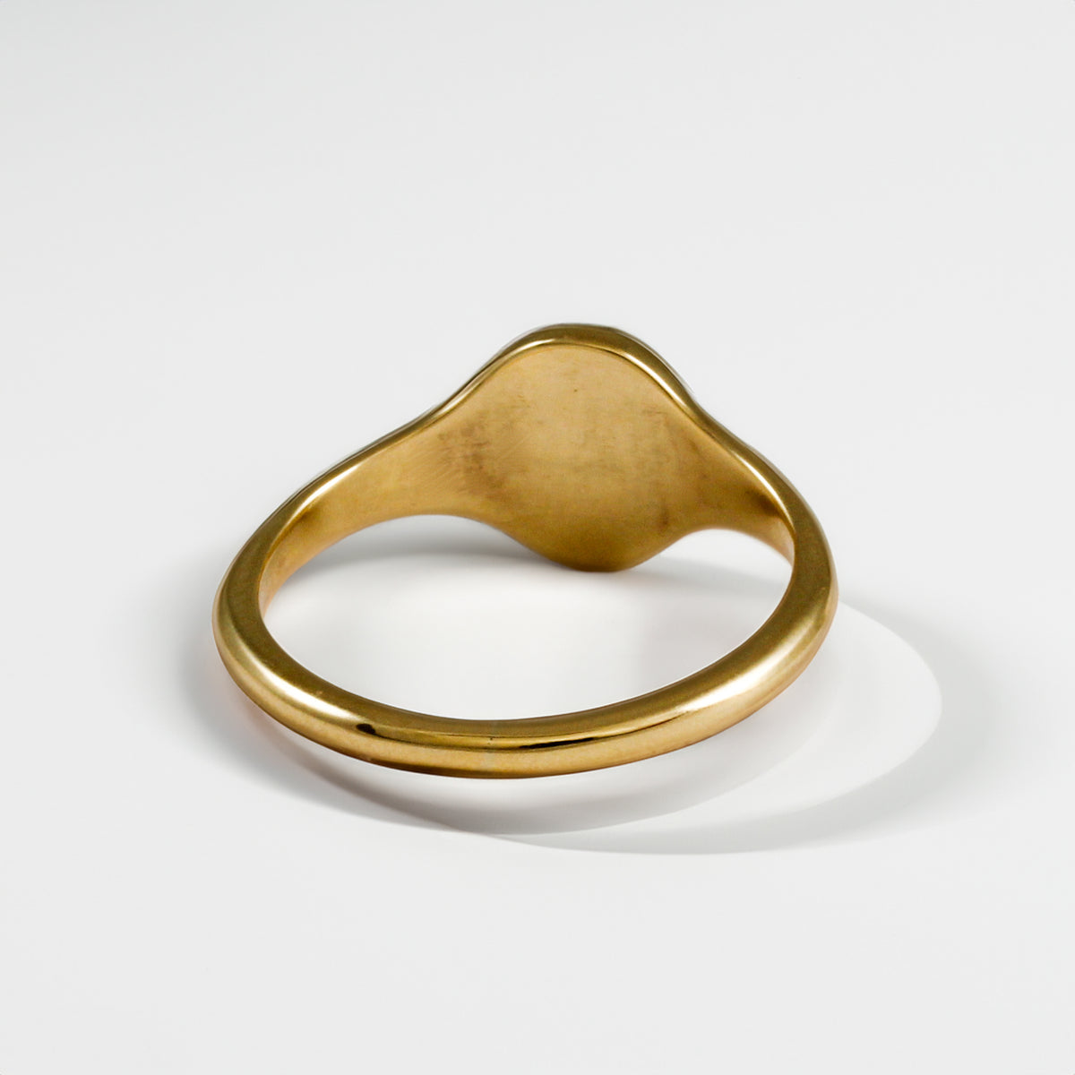 small sized solid gold signet ring