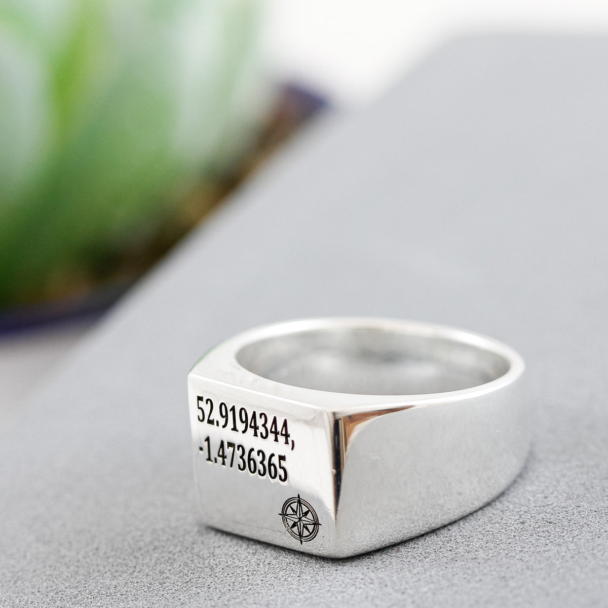 silver mens signet rings with latitude longitude coordinates and compass symbol