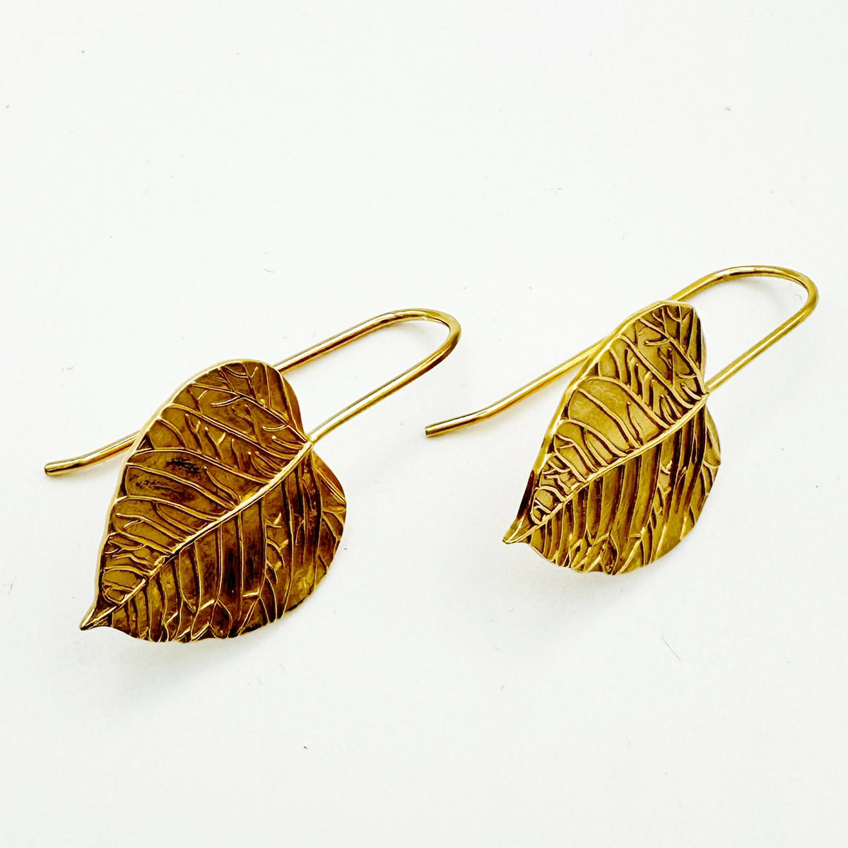 Medium leaf gold plated drop earrings