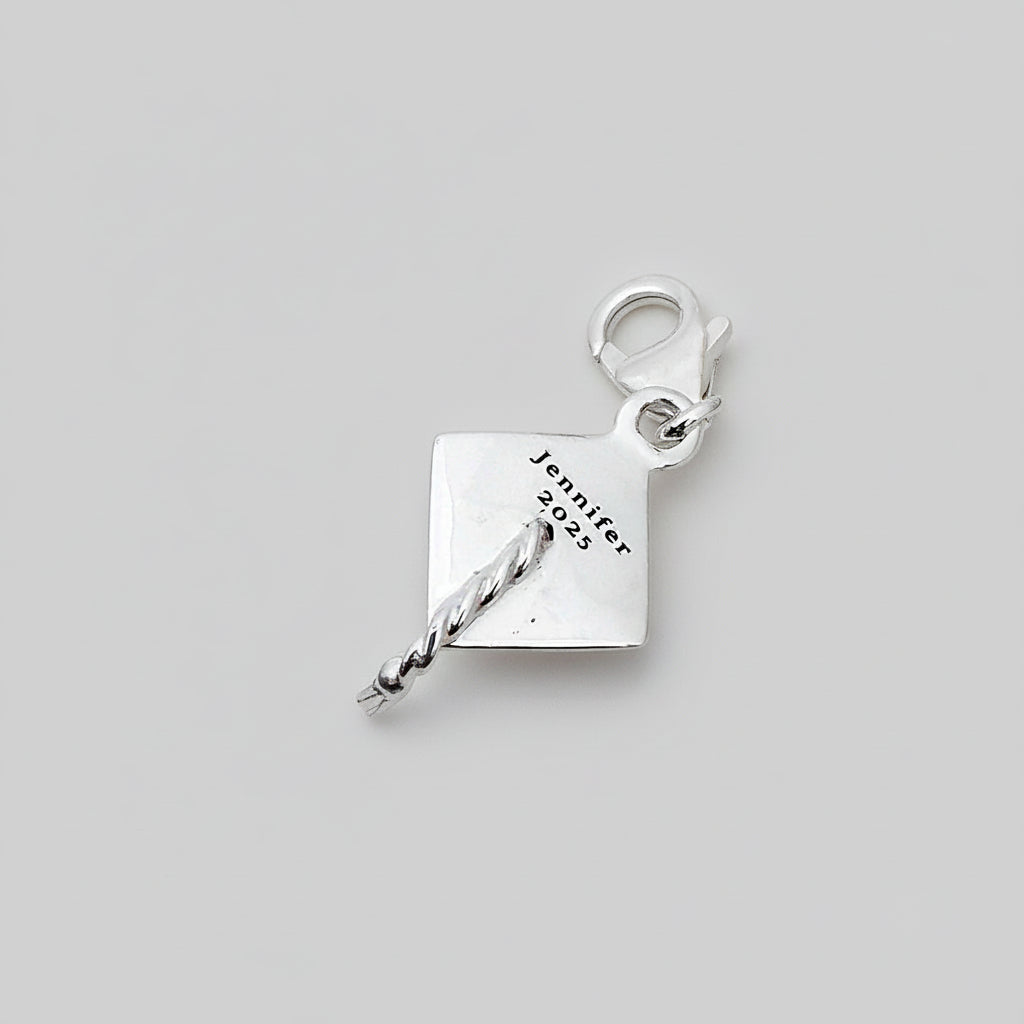 silver graduation cap charm engraved with Jennifer 2025