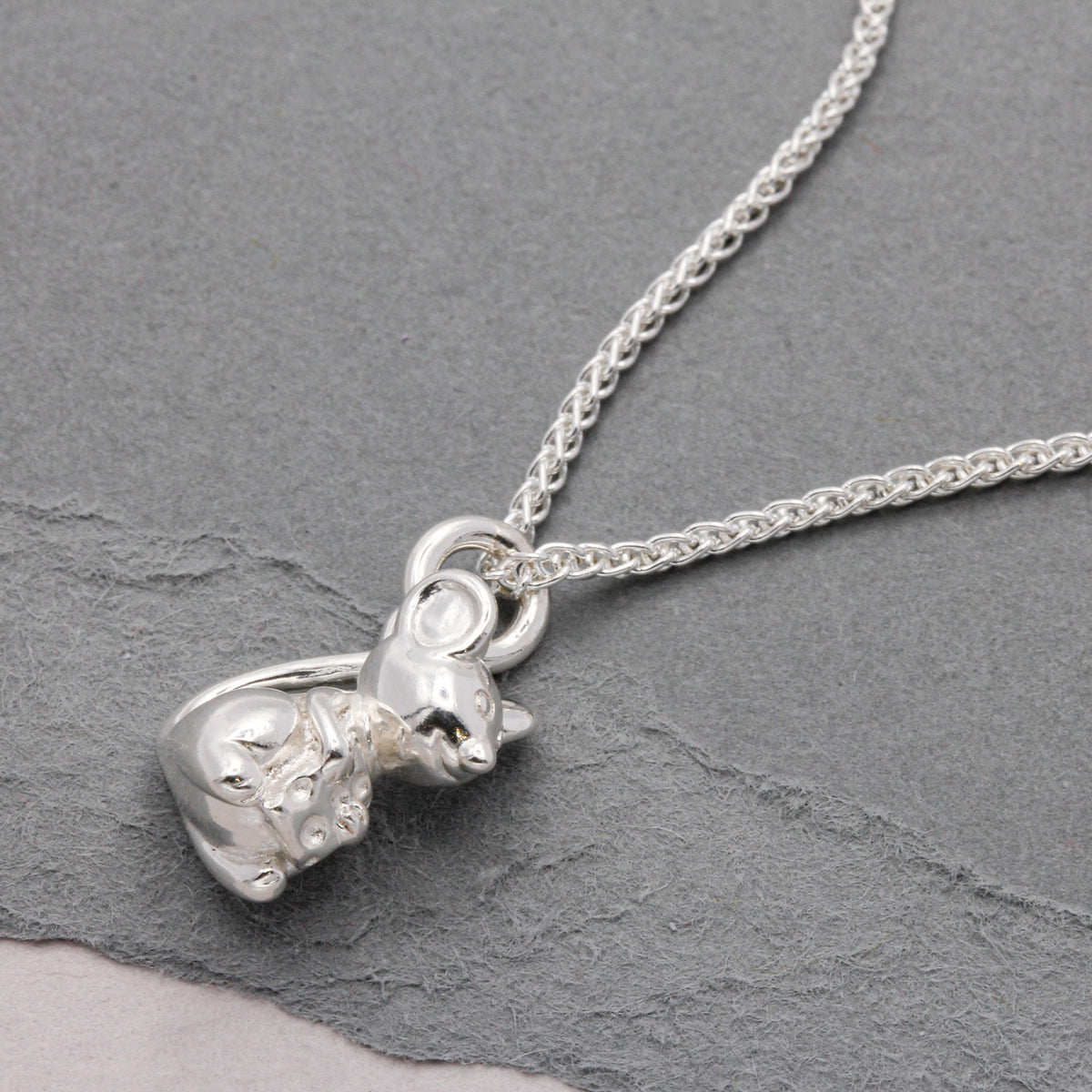 silver mouse charm as a pendant