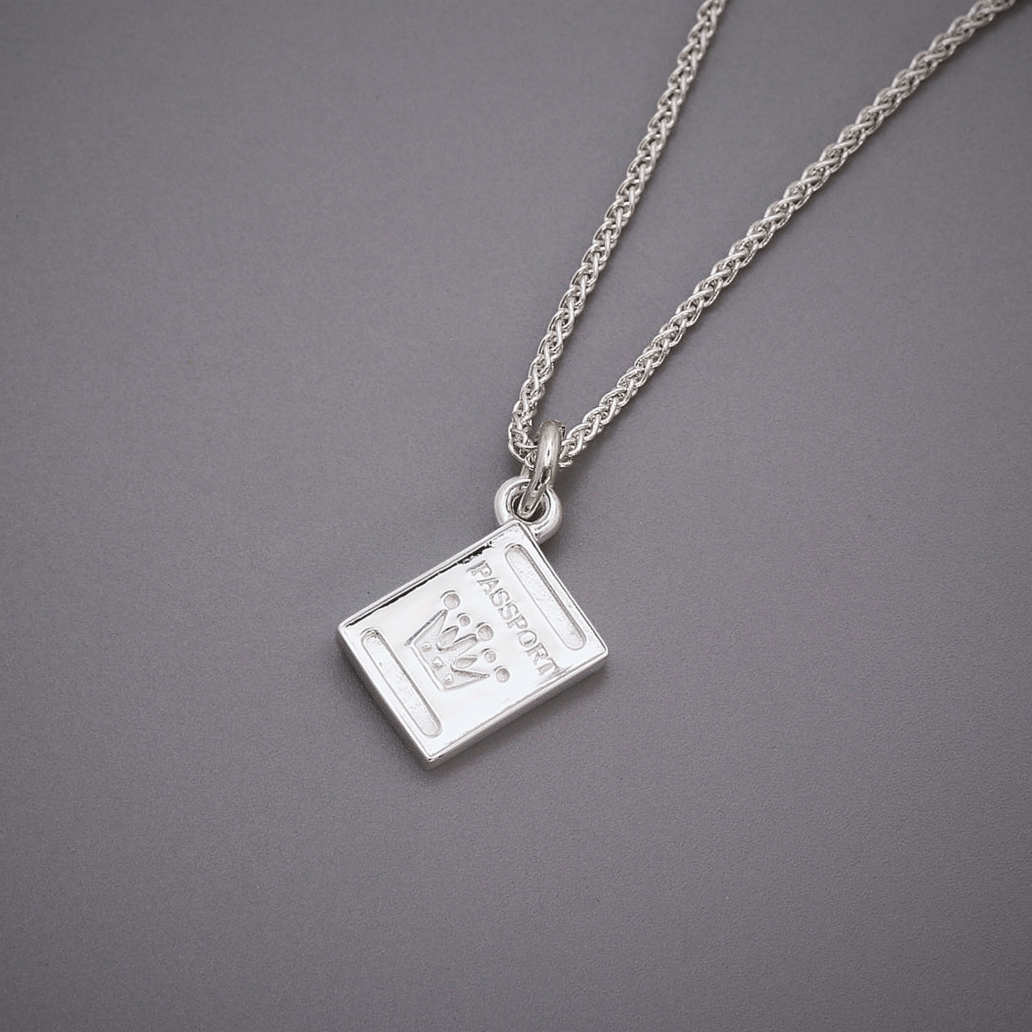 silver passport charm necklace