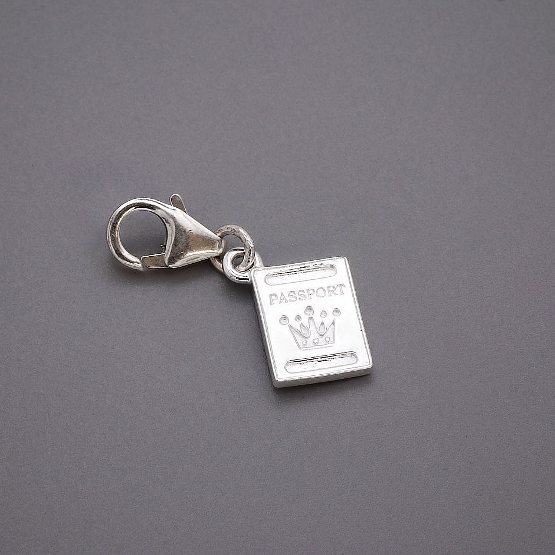 silver passport charm with clip on clasp