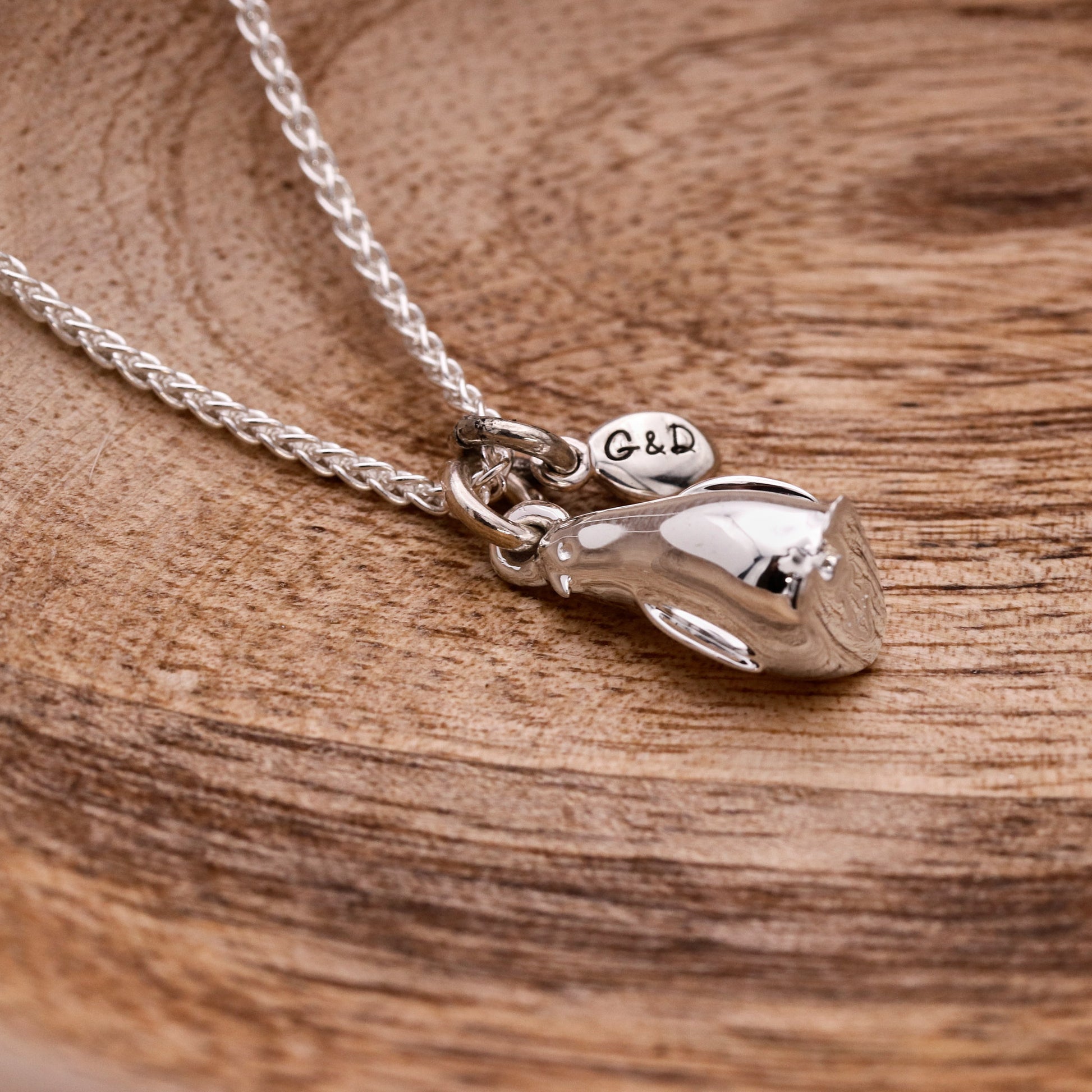 silver penguin and pebble necklace engraved G&D
