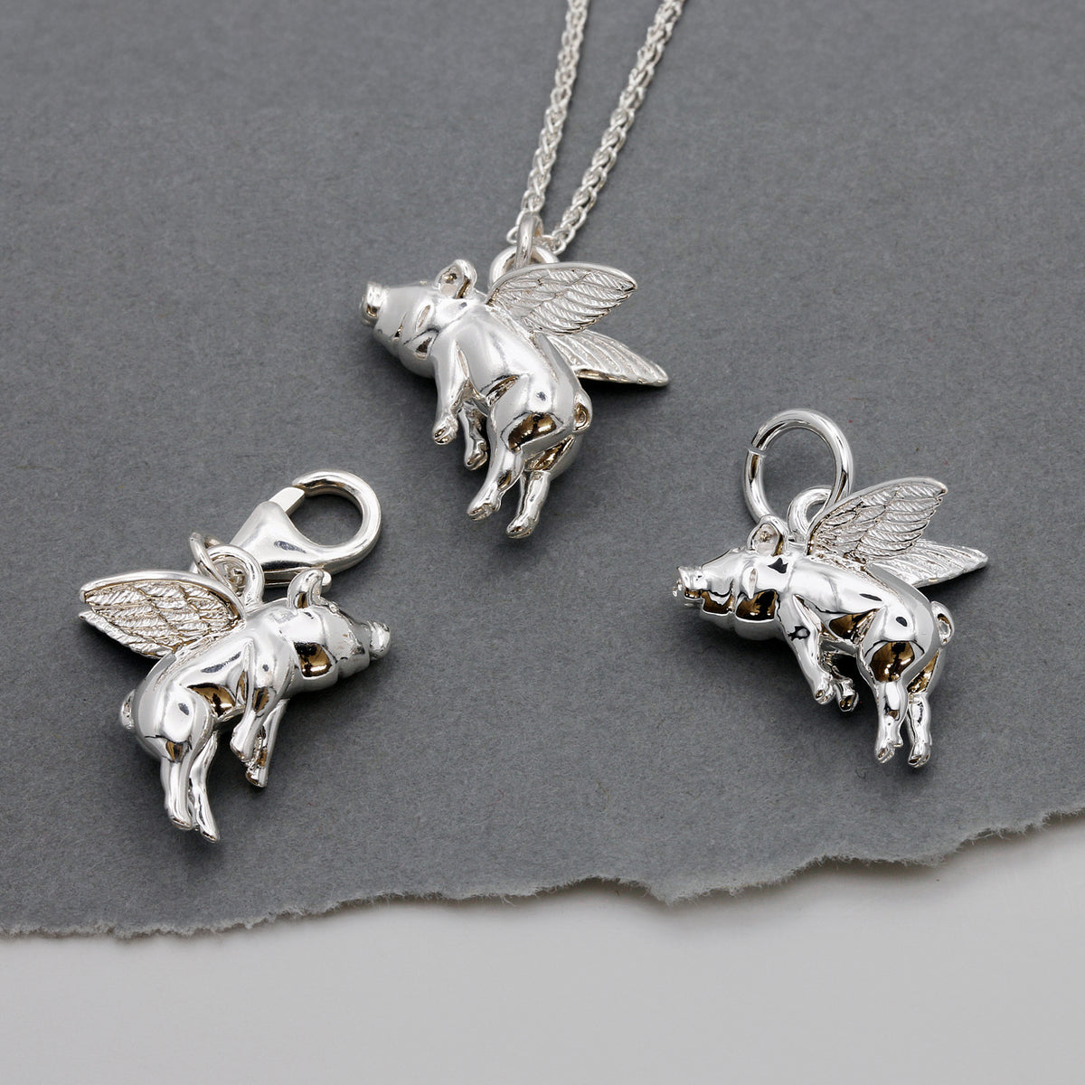 silver flying pig charm jewellery