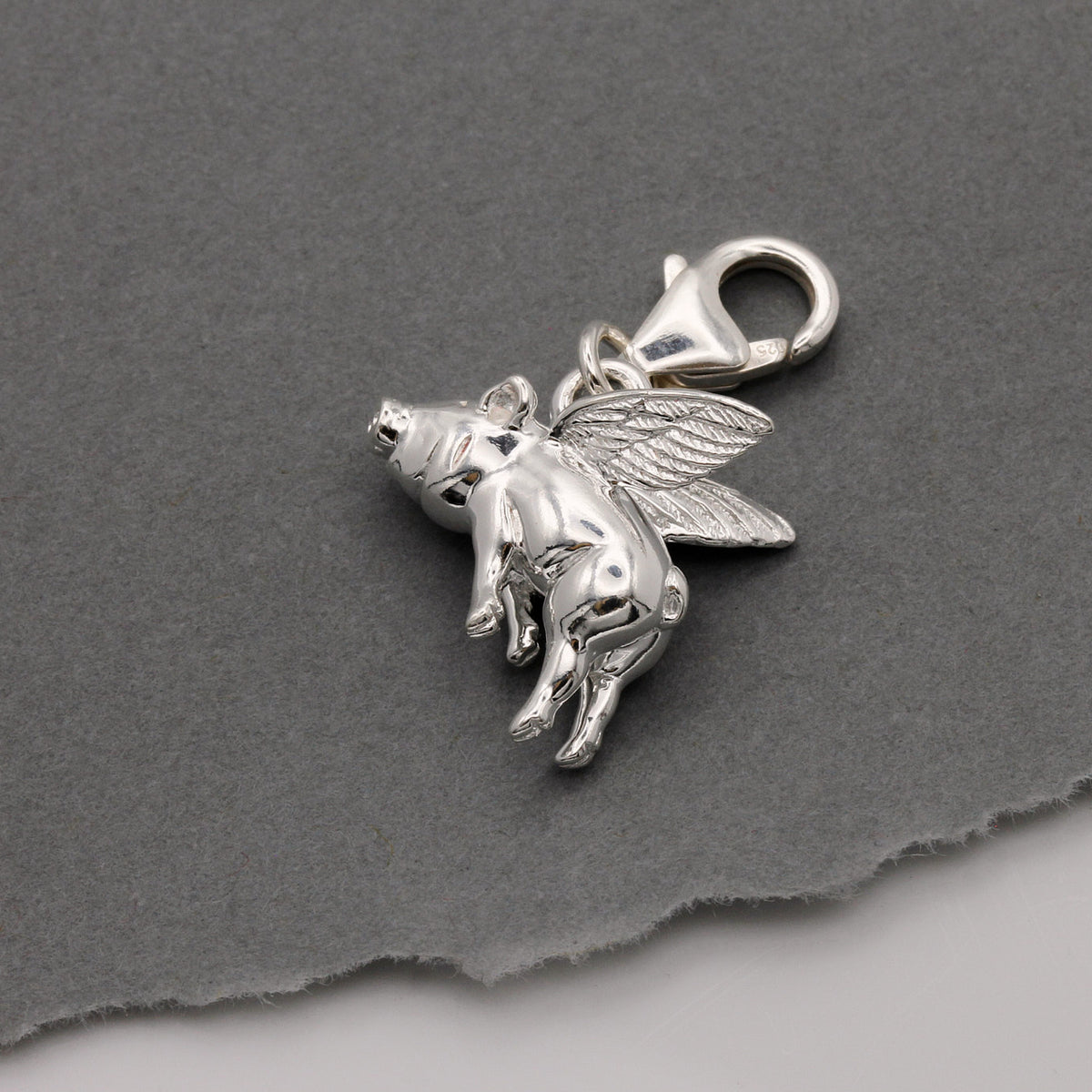 silver flying pig charm with clip on clasp