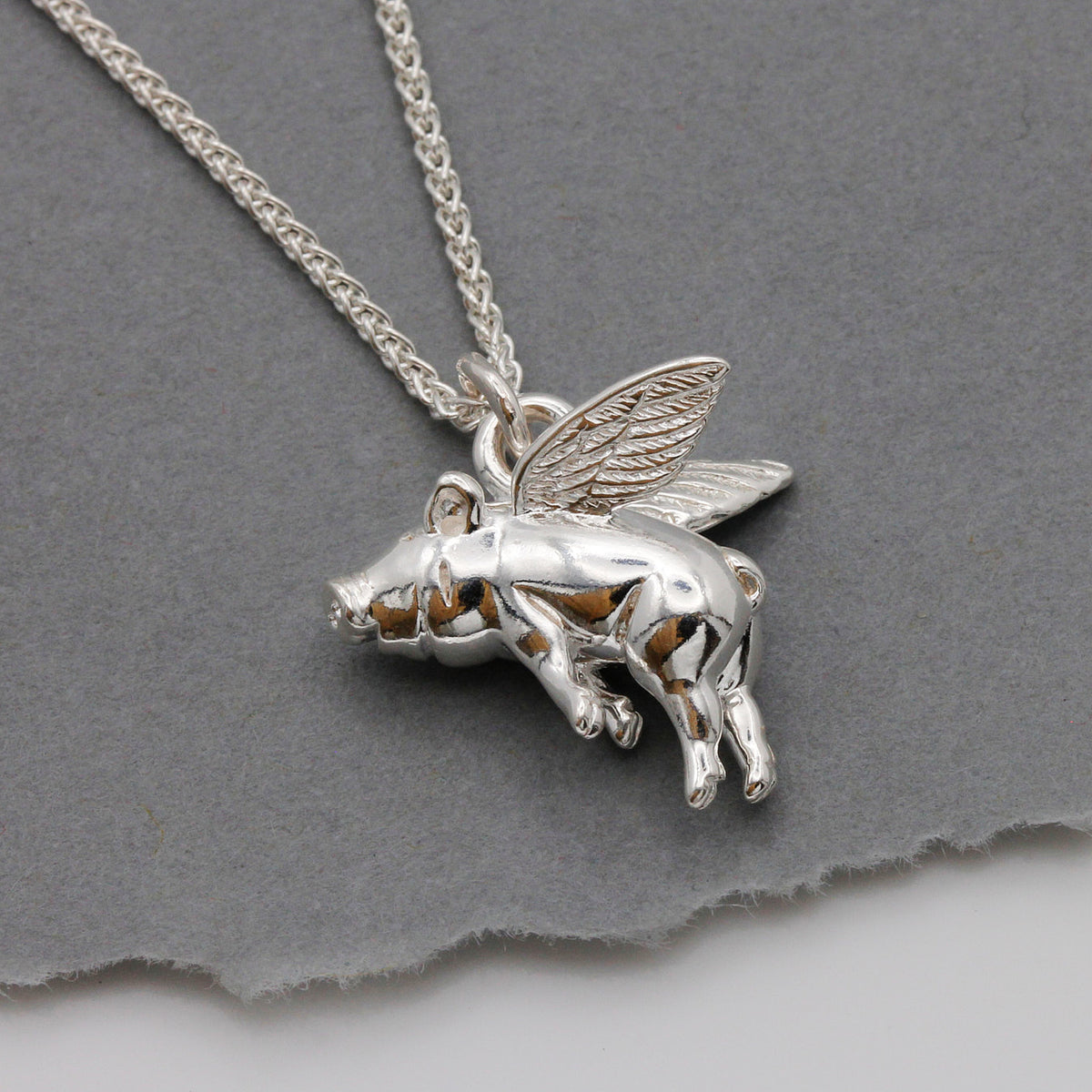 silver flying pig charm necklace