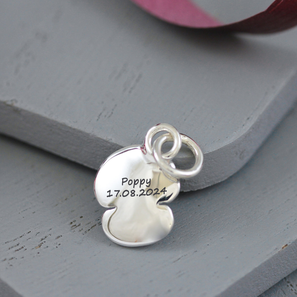 sterling silver remembrance poppy inspired charm with engraved back