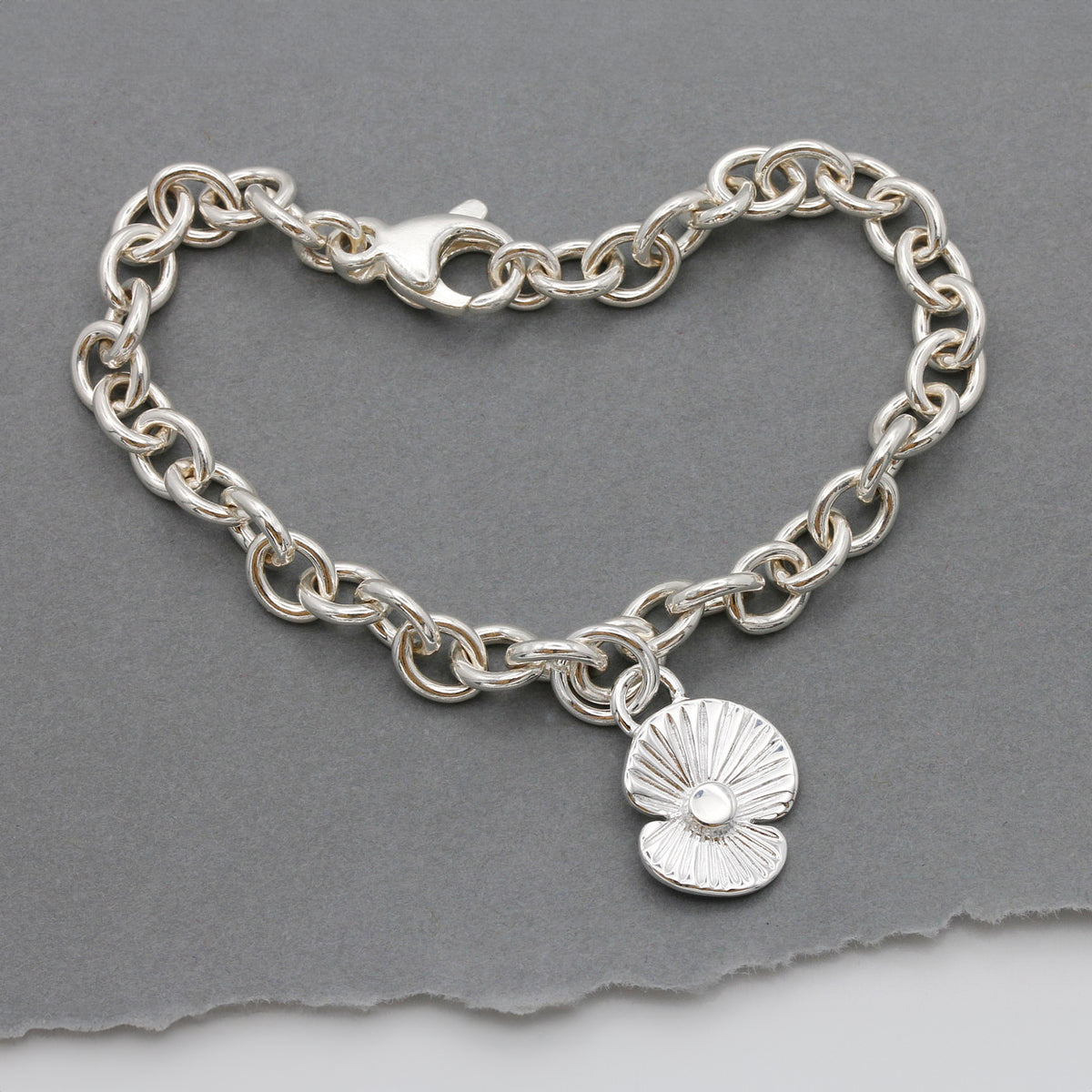 sterling silver remembrance poppy inspired charm bracelet