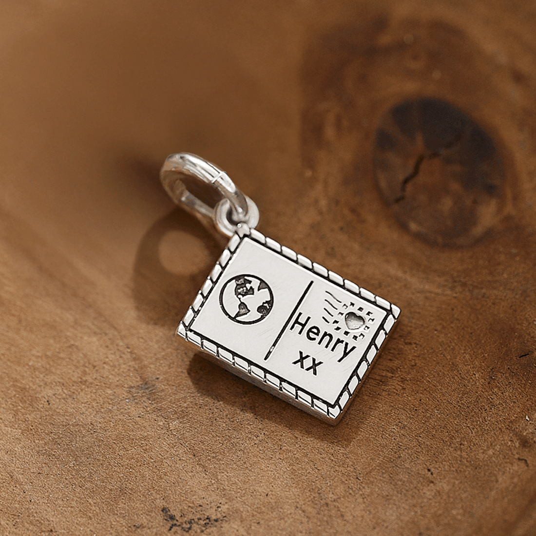 personalised silver postcard charm with globe symbol and name