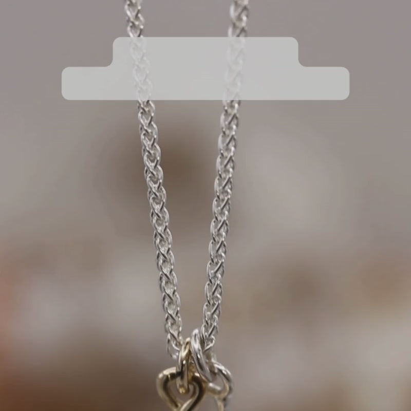 Load video: silver &amp; solid gold acorn and oak leaf necklace