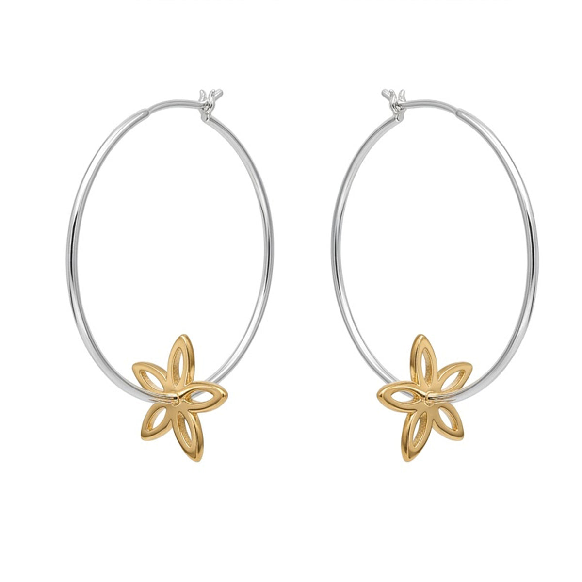 A pair of silver-tone hoop earrings with a small gold-tone flower charm hanging from the bottom of each hoop, shown on a plain white background.