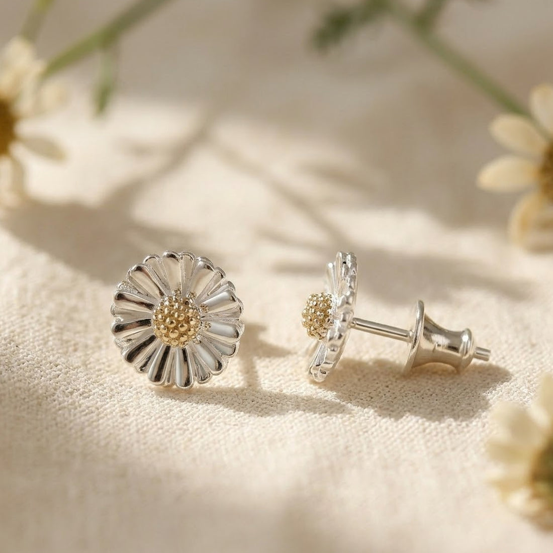 silver and gold daisy flower stud earrings