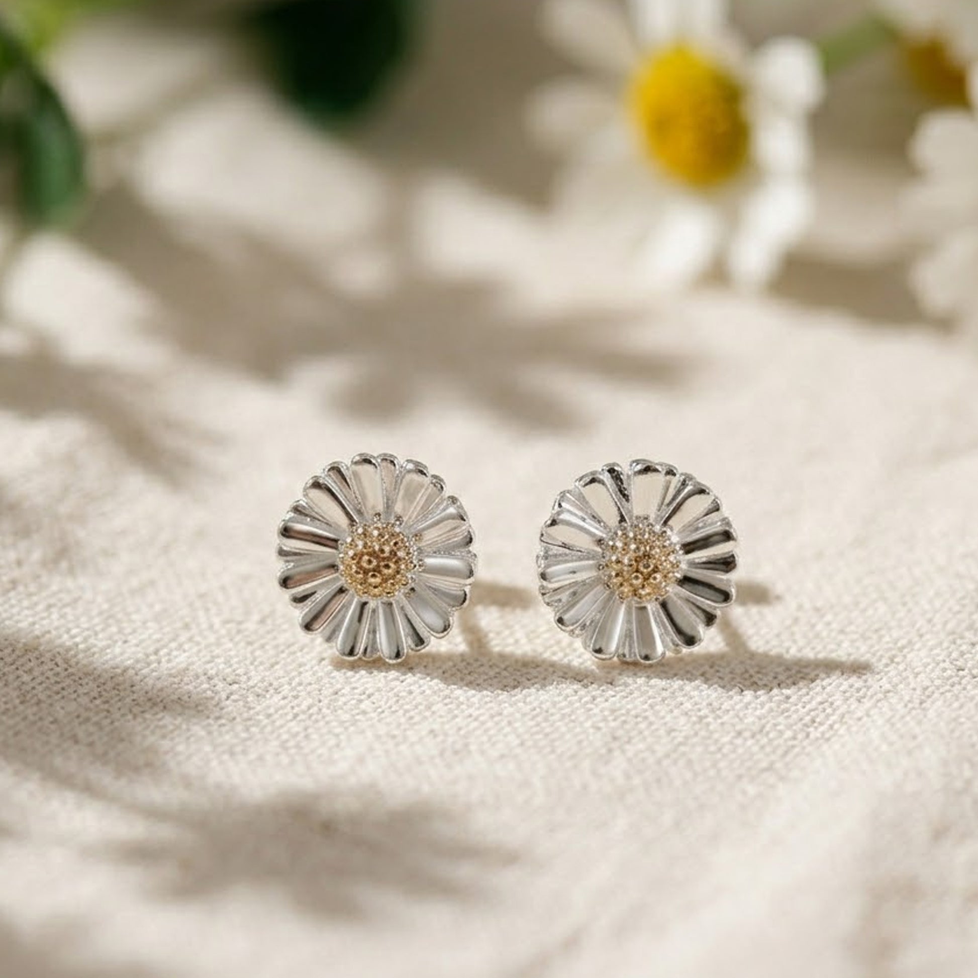 silver and gold daisy flower stud earrings