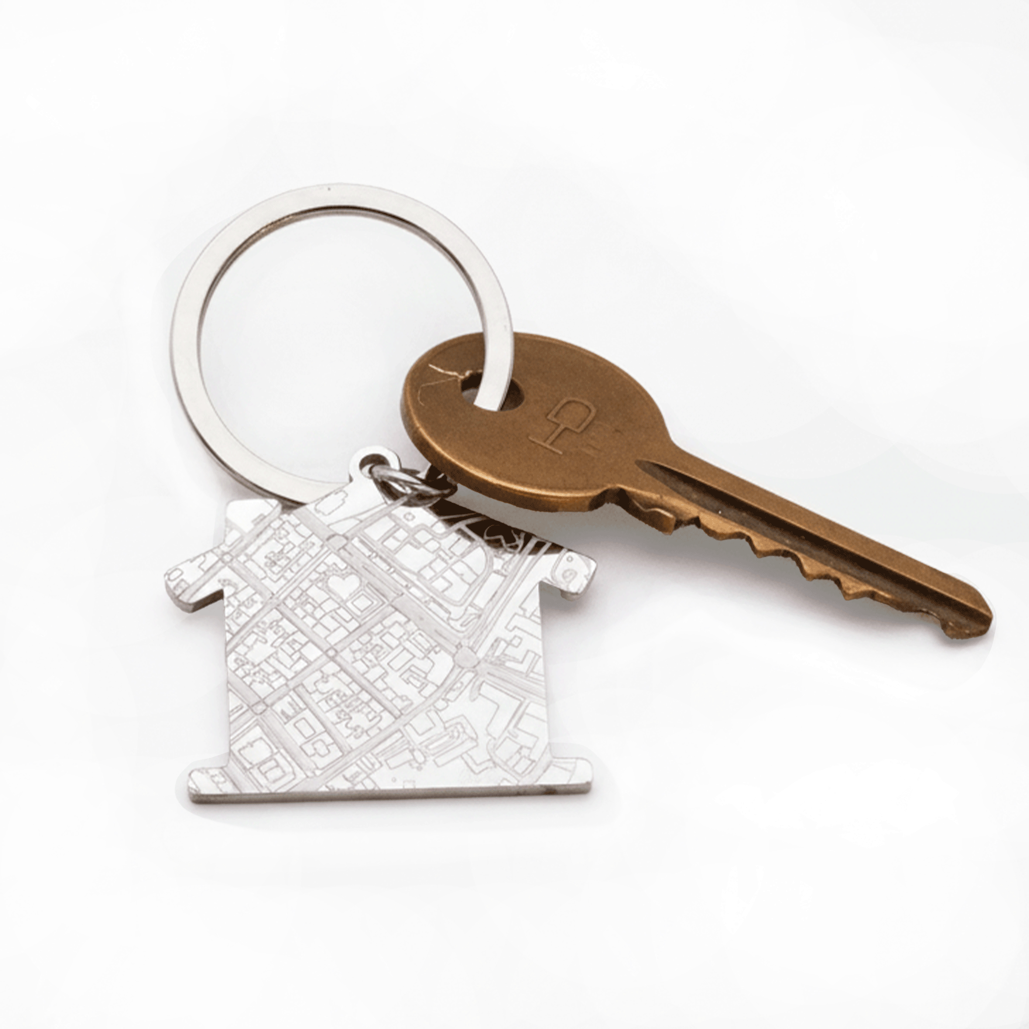House shaped silver keyring with map design