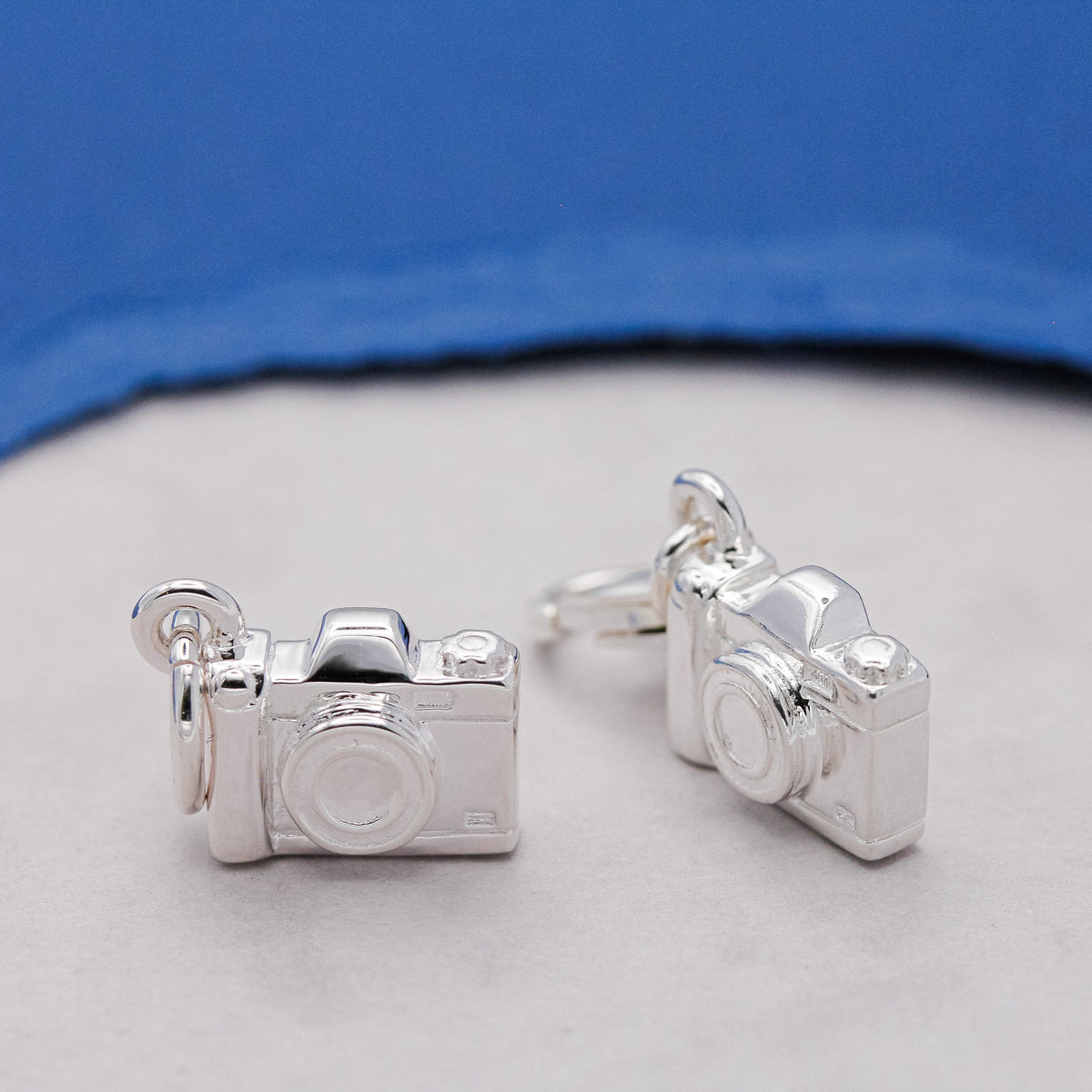 Sterling silver vintage style camera charm with detailed lens and buttons