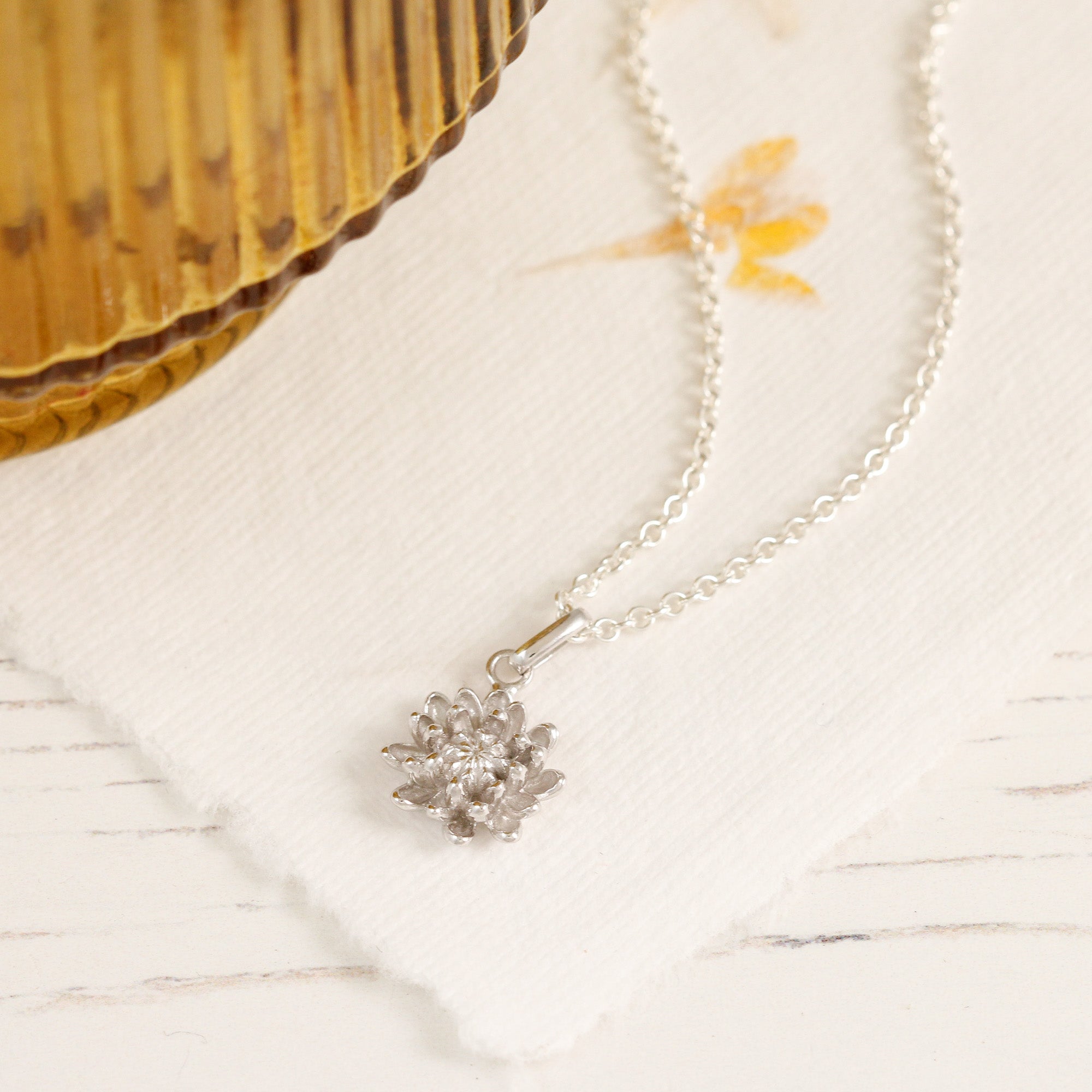 silver chrysanthemum flower pendant chelsea flower show