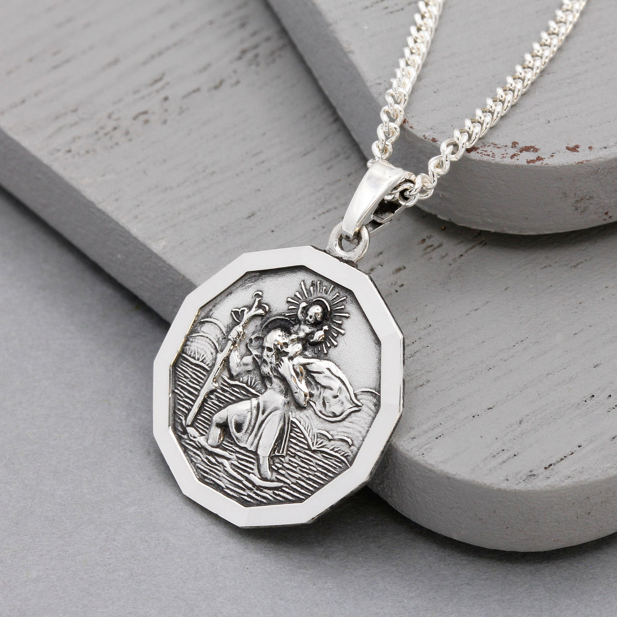 oxidised silver dodecagon shaped saint christopher on curb chain