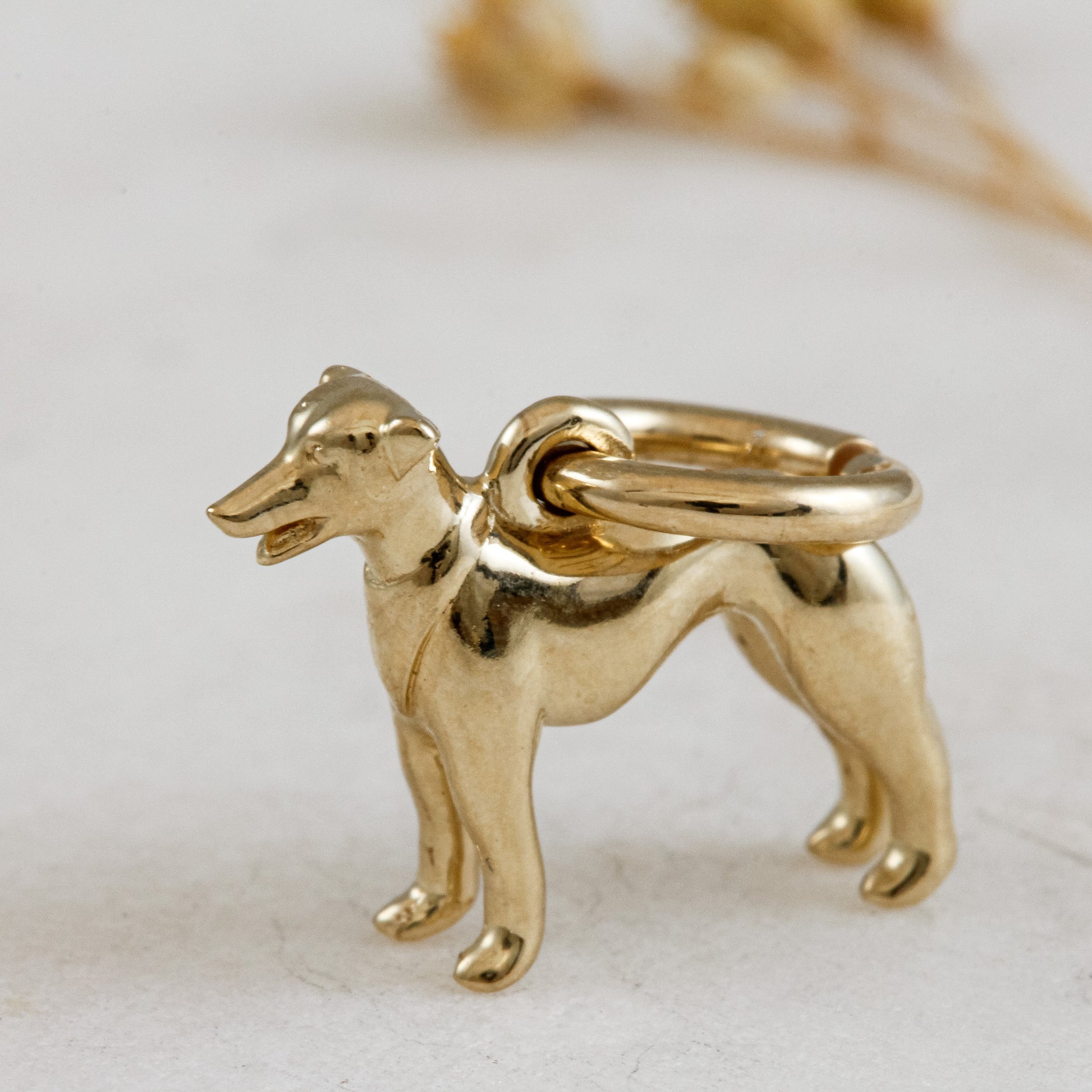 whippet or greyhound solid gold dog charm for a necklace or bracelet