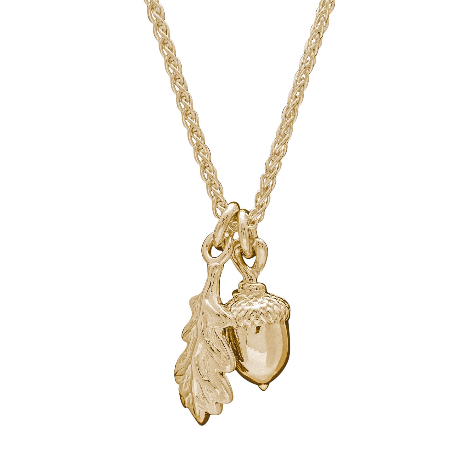 solid gold acorn and oak leaf necklace on light spiga chain