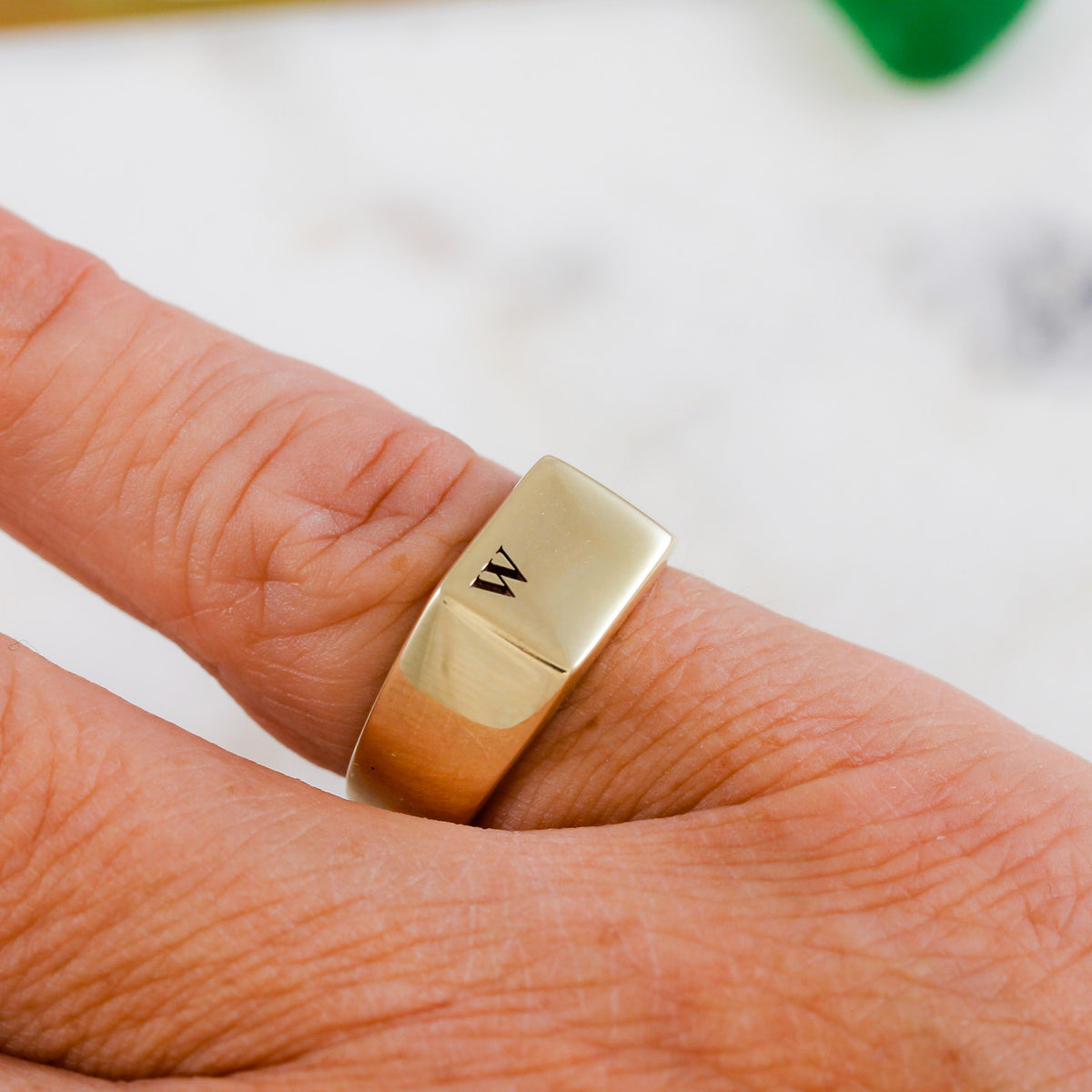 solid gold signet ring engraved with initial W