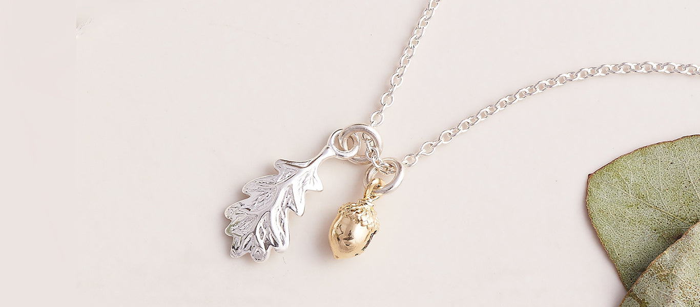 Gold acorn and oak leaf silver necklace