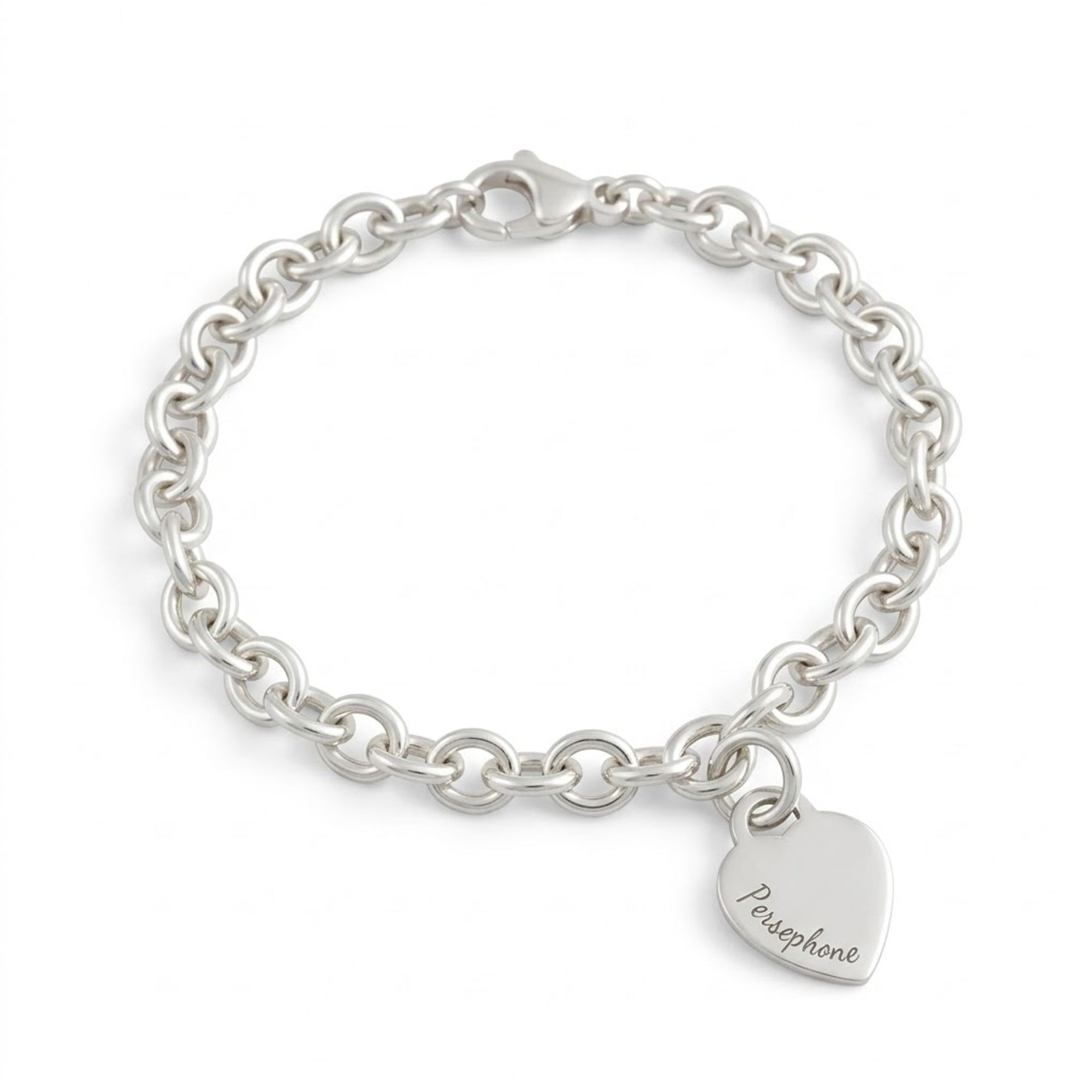 silver charm bracelet with engraved heart charm