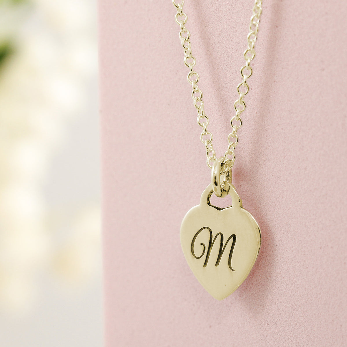 gold plated sterling silver tiny heart tag personalised necklace with initial and message