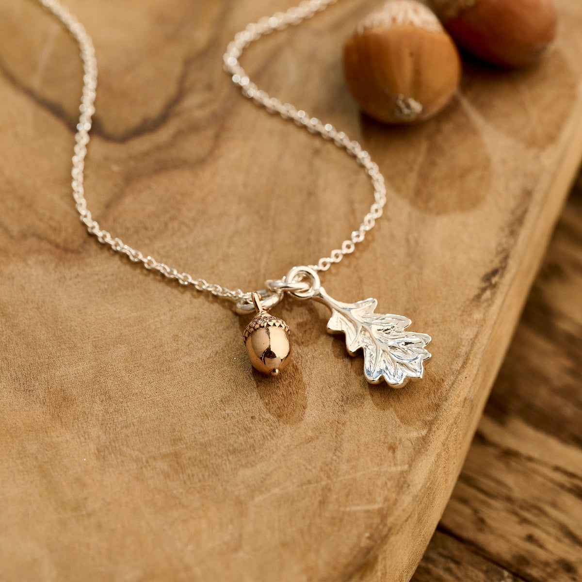 tiny rose gold acorn and oak leaf necklace