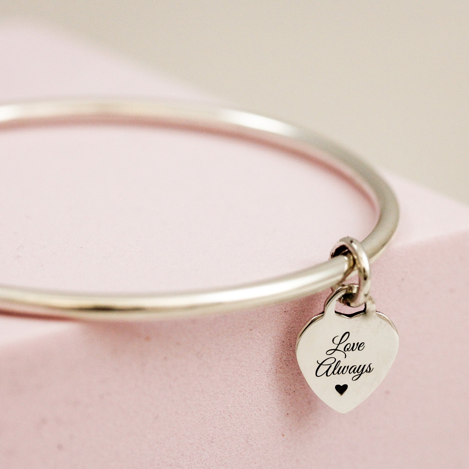 3mm bangle with engraved initial on tiny heart tag