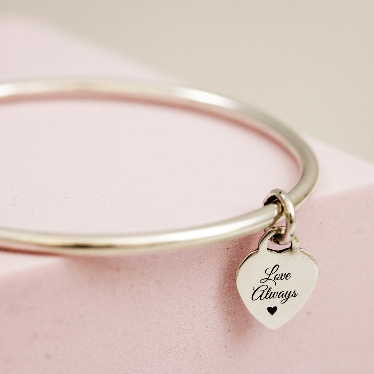 3mm bangle with engraved initial on tiny heart tag