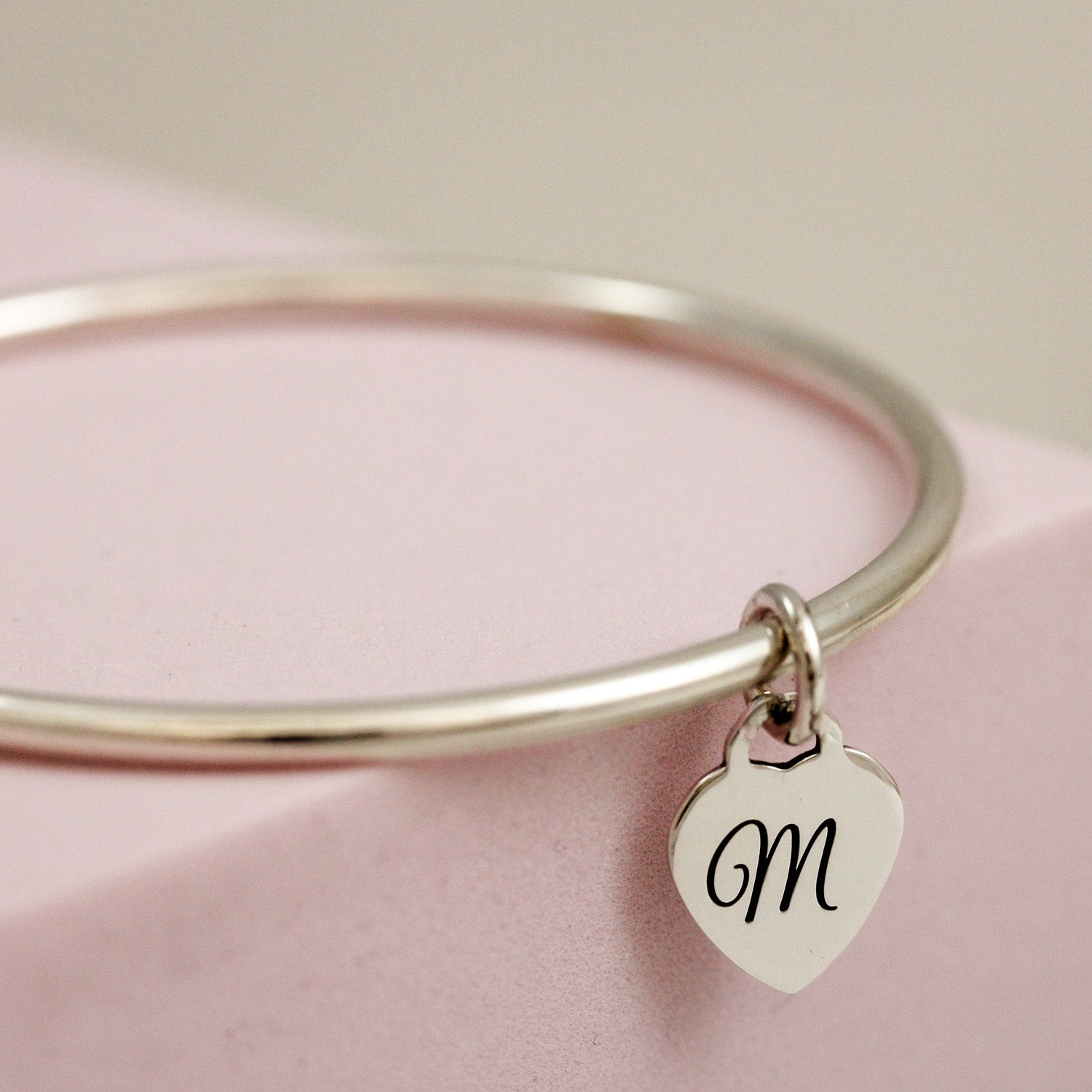3mm bangle with engraved initial on tiny heart tag