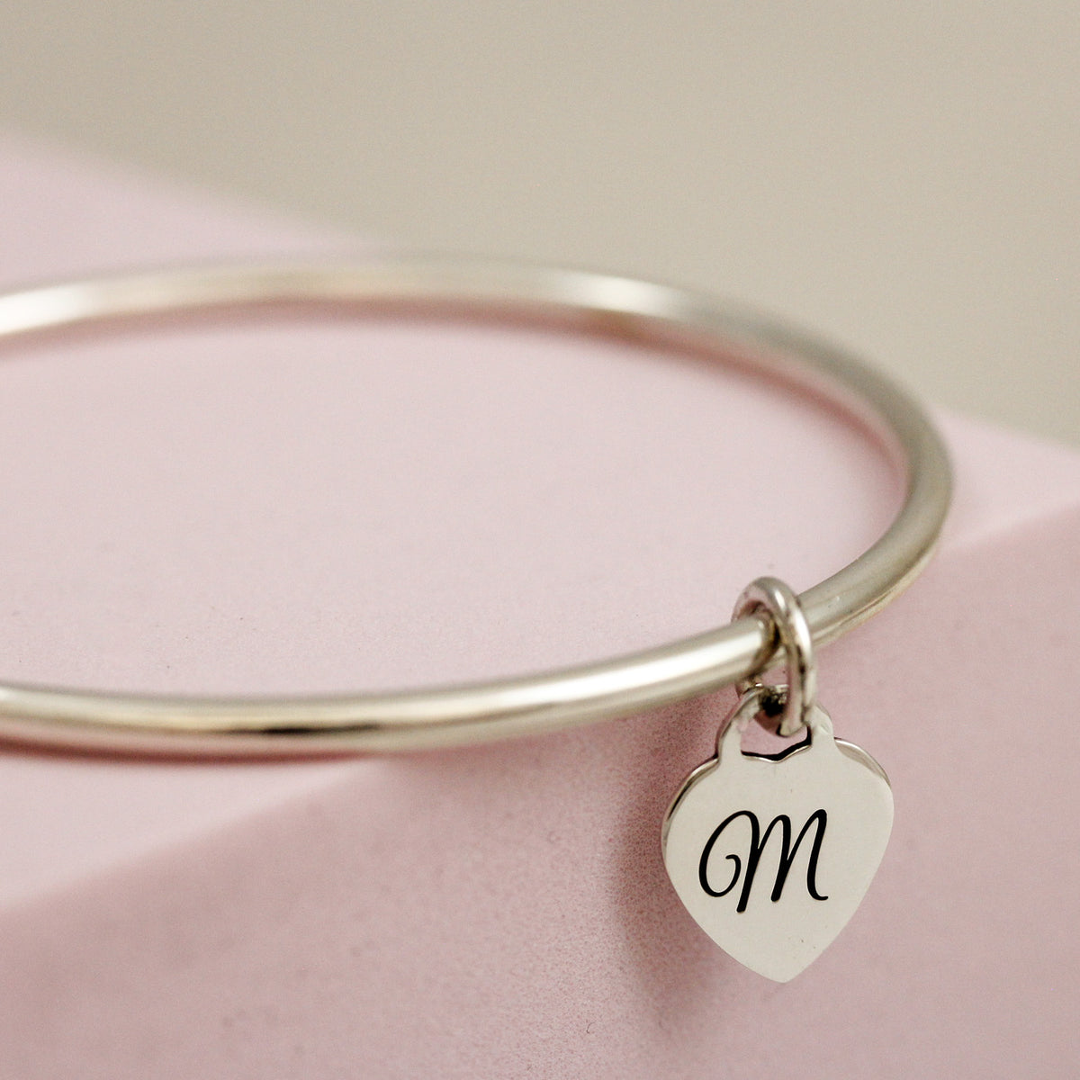 3mm bangle with engraved initial on tiny heart tag