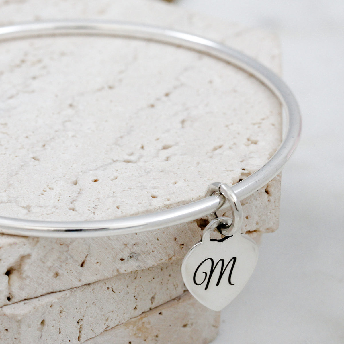 2.5mm bangle with engraved initial on tiny heart tag