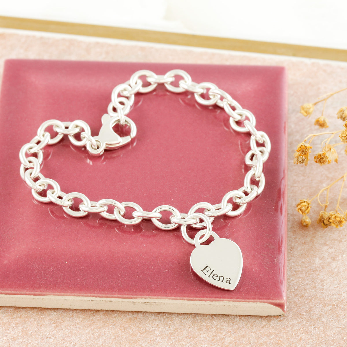 silver starter charm bracelet with name engraved on heart