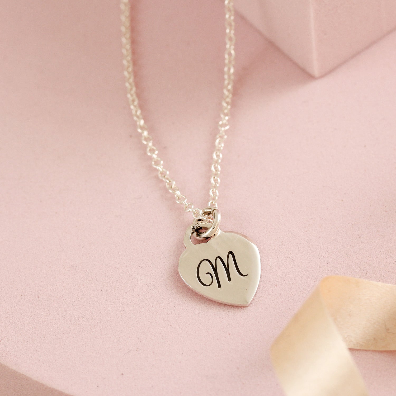 sterling silver tiny heart tag personalised necklace with initial and message