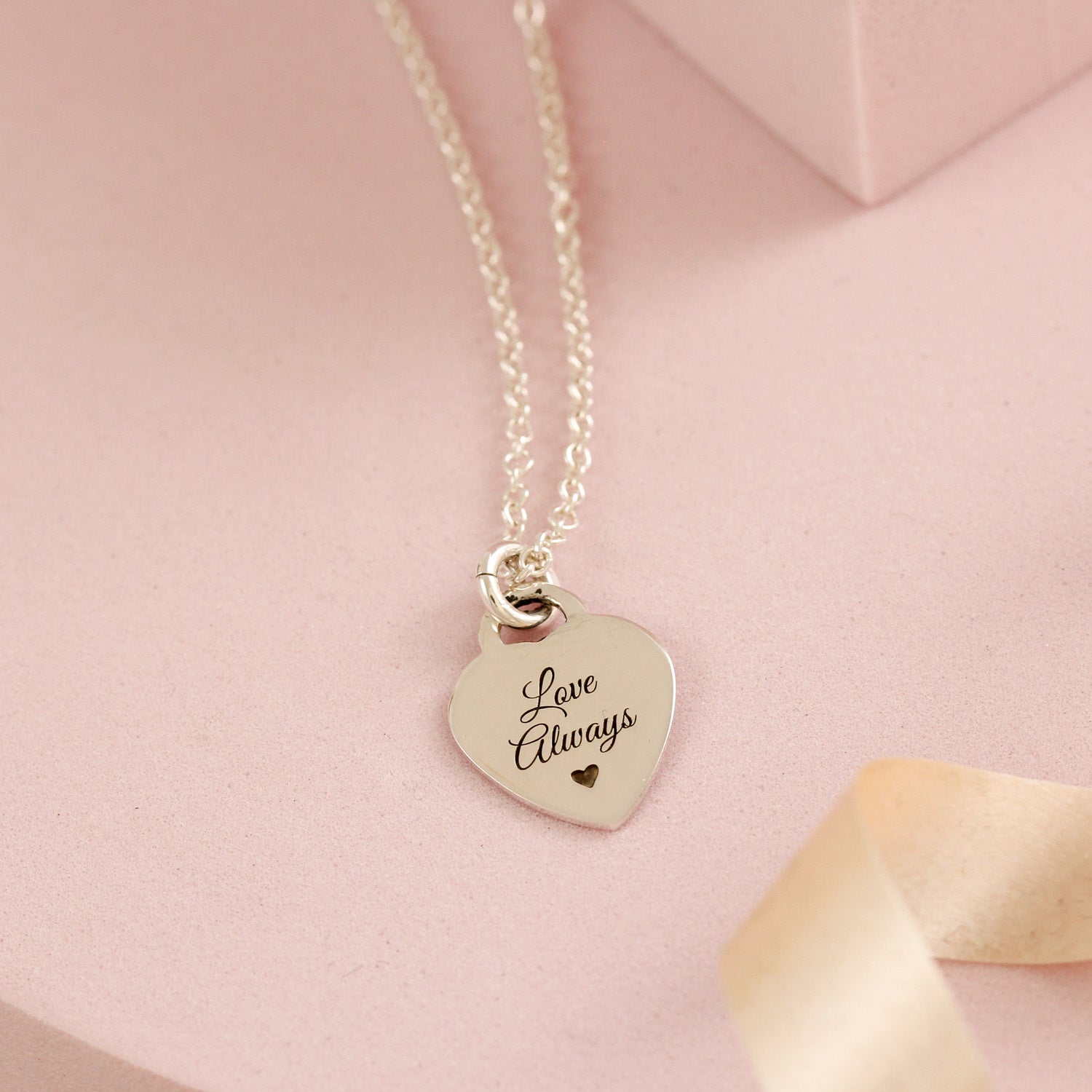 sterling silver tiny heart tag personalised necklace with initial and message