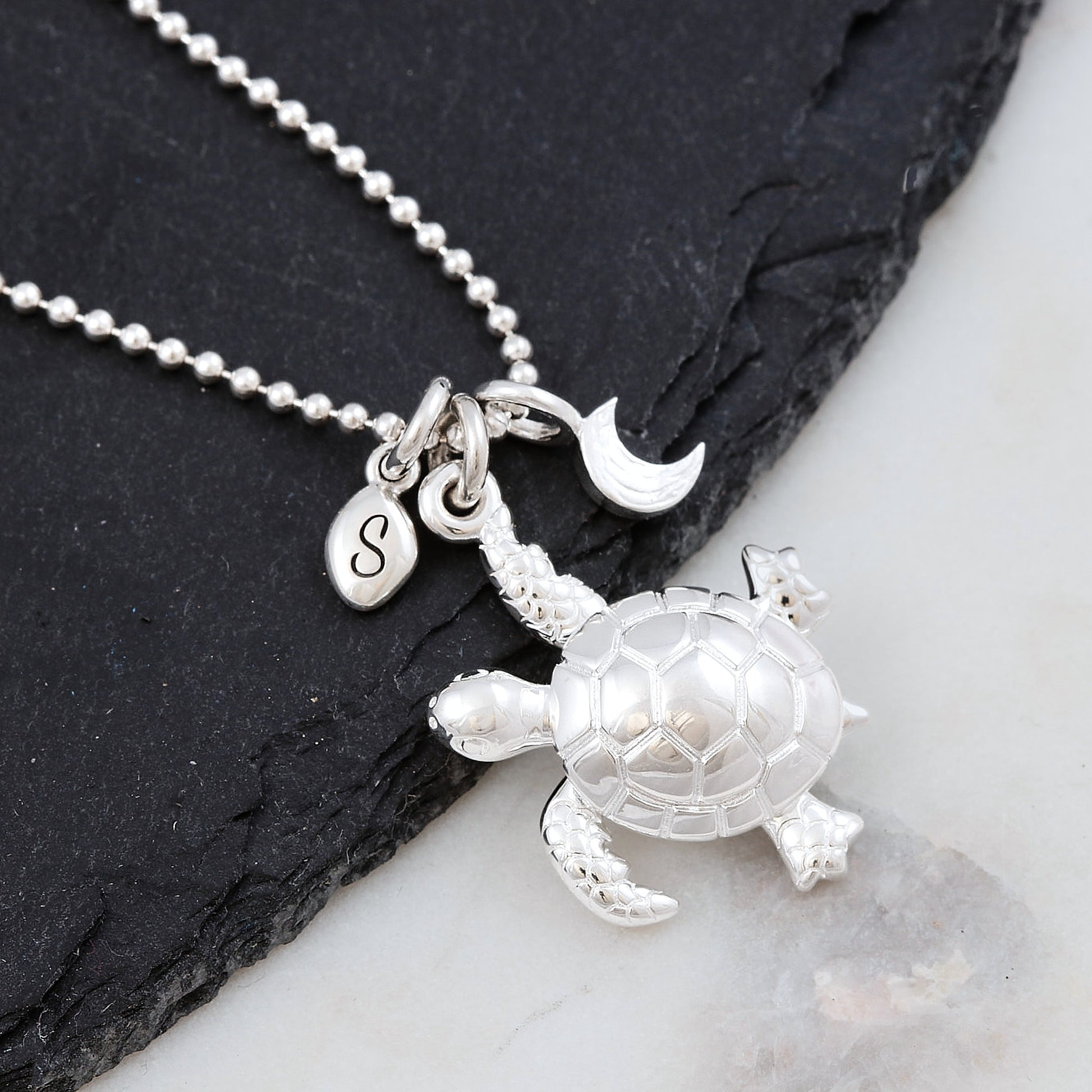 silver turtle moon and pebble engraved necklace