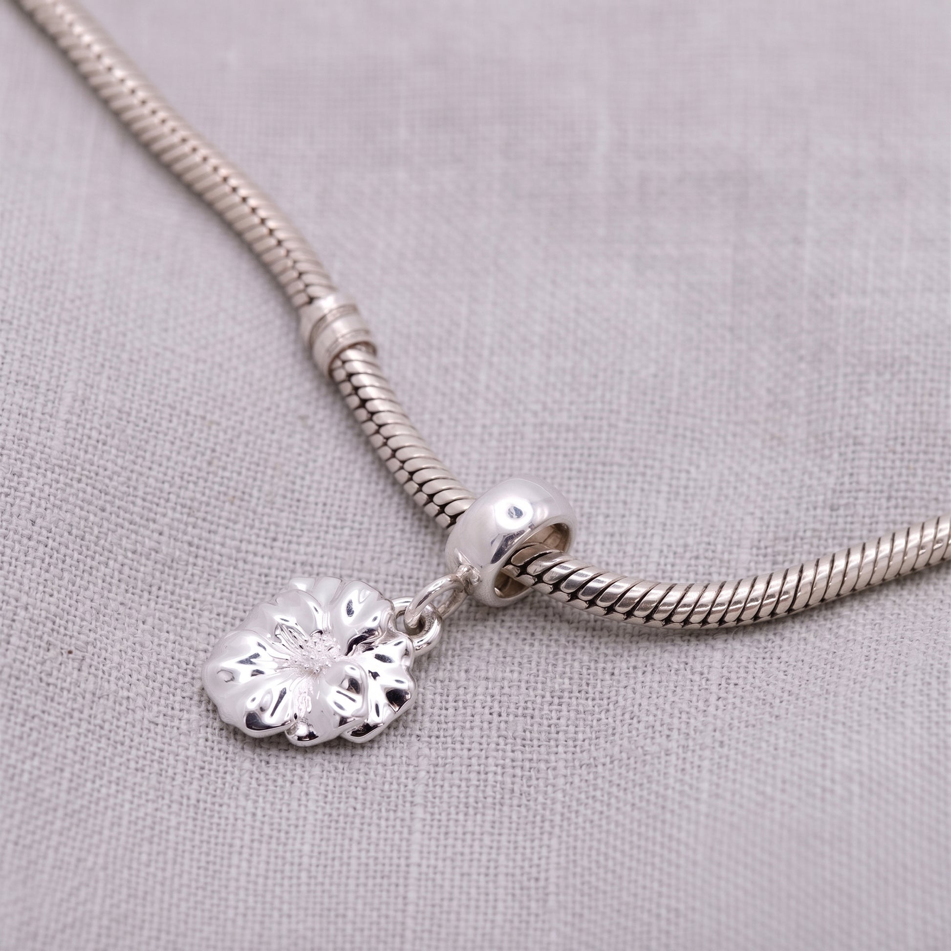 silver violet pansy flower charm on charm bracelet