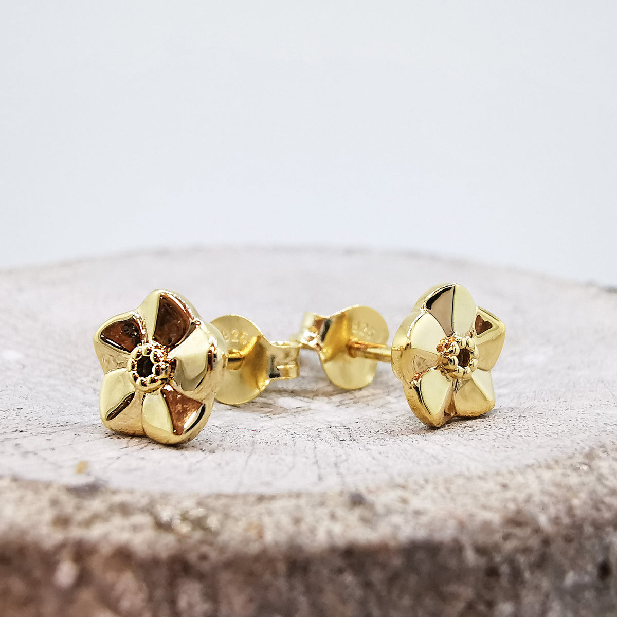gold vermeil tiny forget me not flower stud earrings scarlett jewellery chelsea flower show