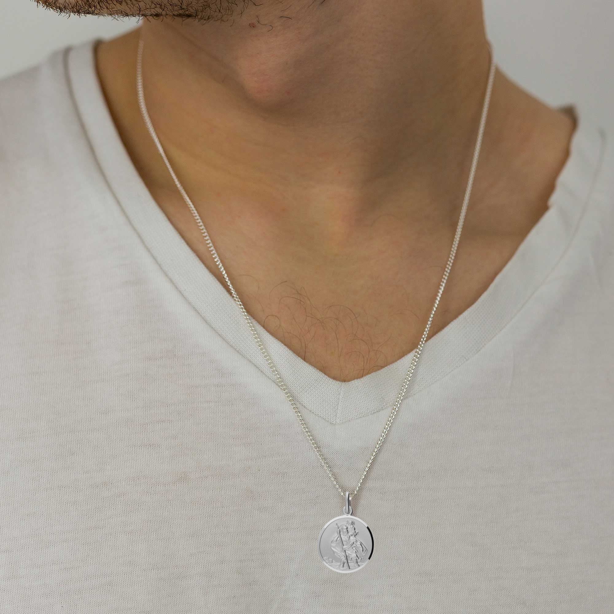polished solid silver St Christopher necklace on curb chain